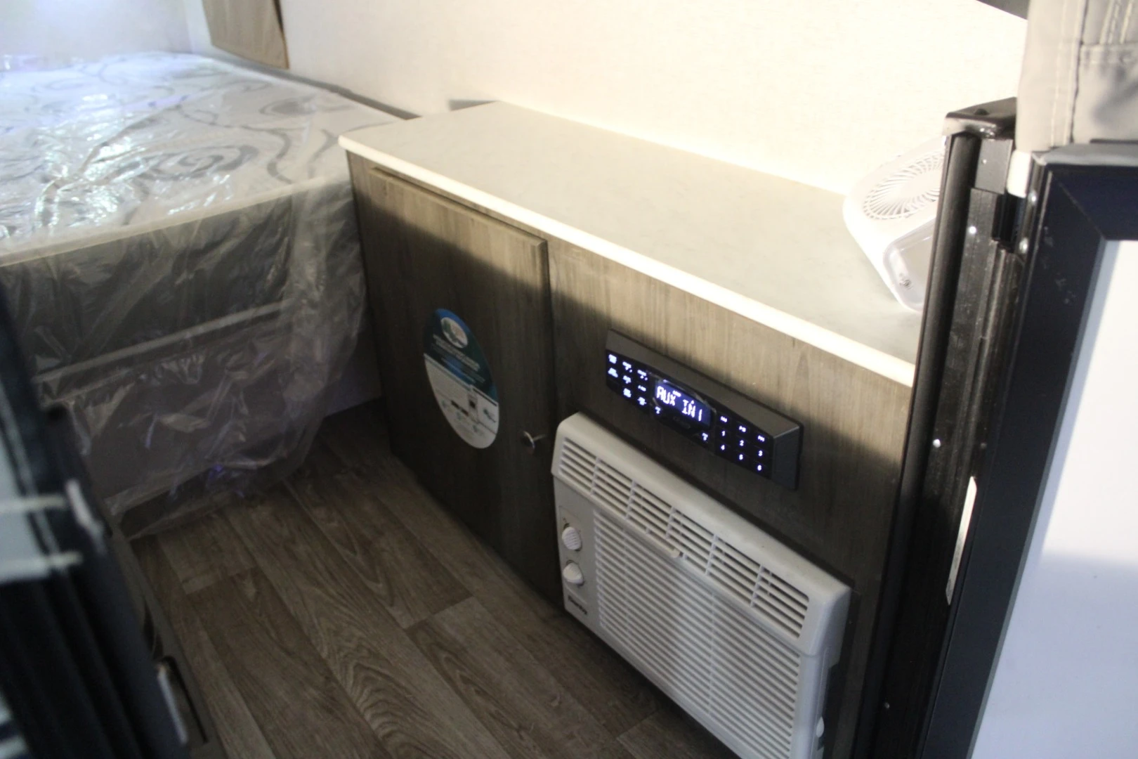 One thing we found truly odd when walking around the RVX show was that no matter how small and simple the vehicle, it had equipment like an air conditioner. The Clipper Express 9.0TD comes with both an air conditioner and furnace, which seems particularly strange in a design that's half pop-up tent room