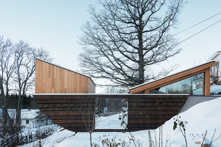 The space feels like a gentle boat, gracefully floating above the landscape