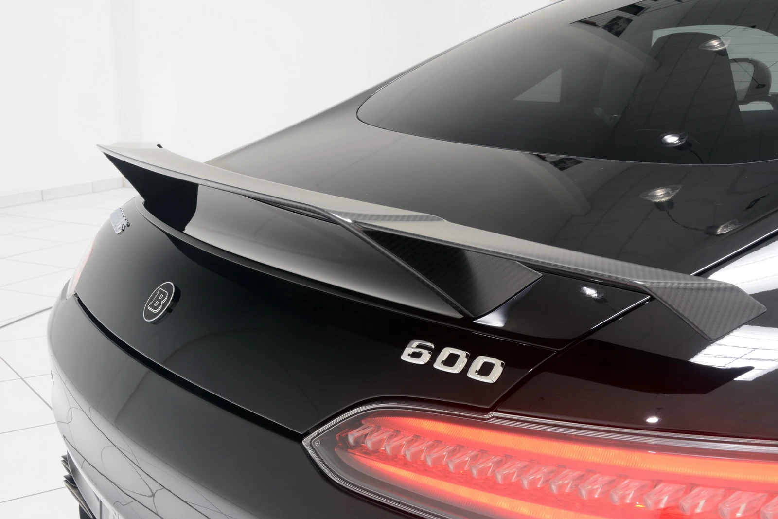 Brabus has fitted a carbon fiber rear spoiler to create downforce at high speed