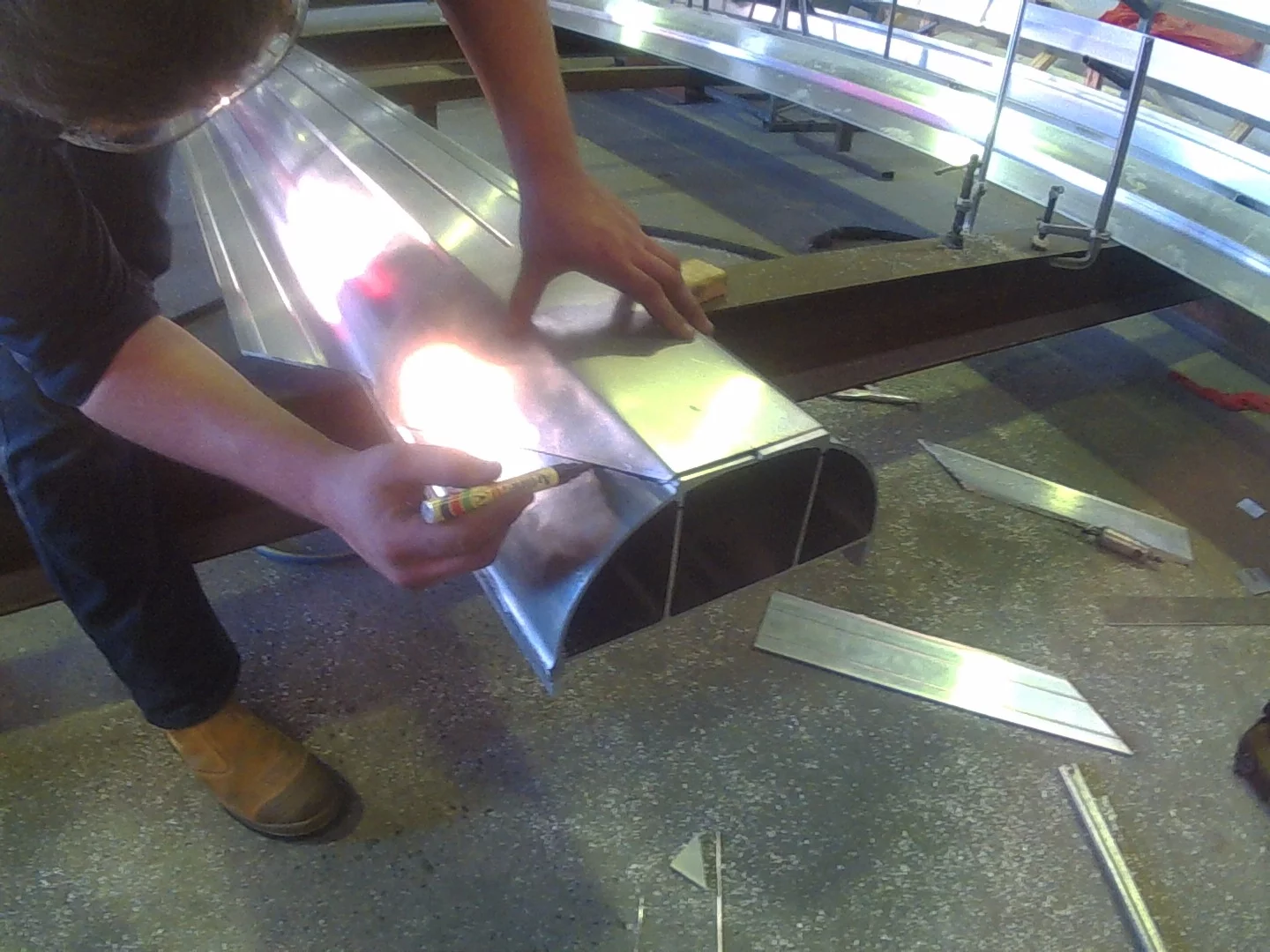 Using a template to draw the leading edge profile for the front of the skis