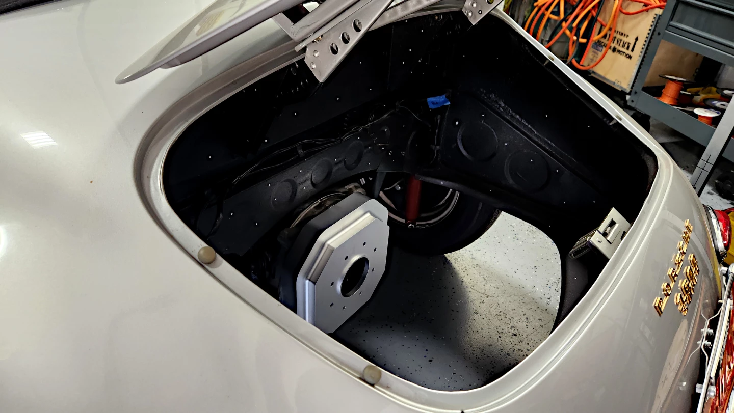 The "constellations" for three dimensional scanning are easily seen in the back of this Porsche along with a custom conversion plate to retain the manual gearbox in the car