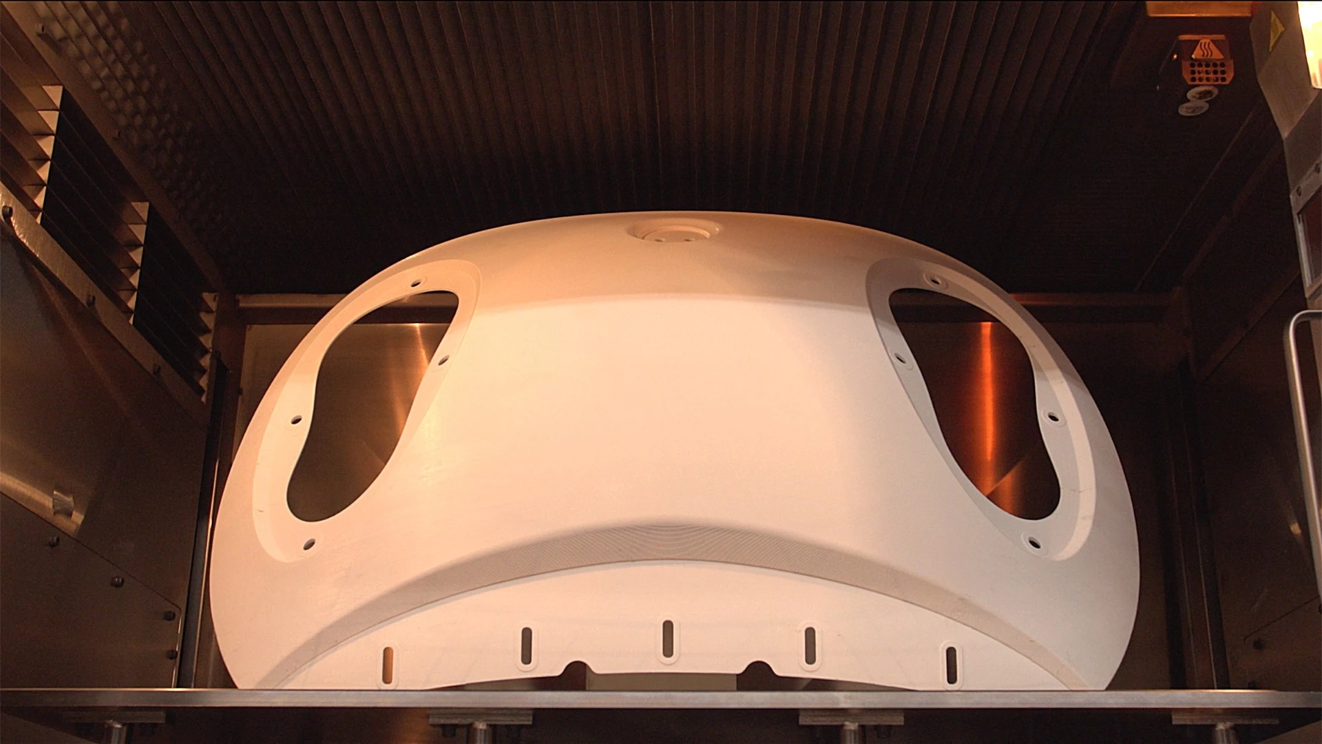 The Micro Commuter's hood panel is produced as a full single piece