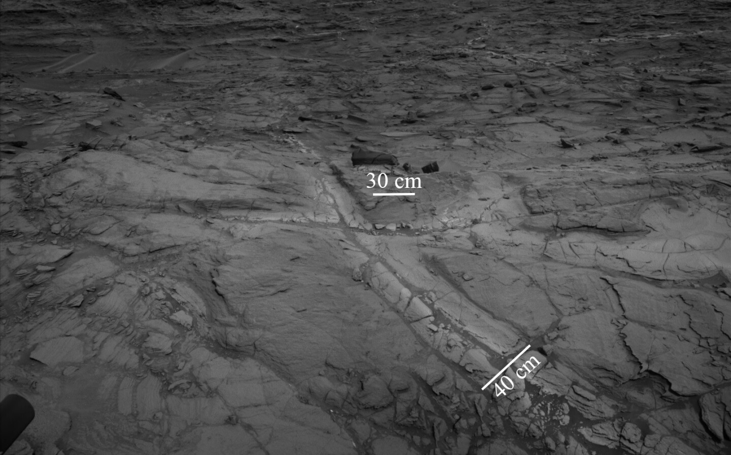 The halos can be seen as the lighter sections of bedrock, around the fractures, in this image from 2015