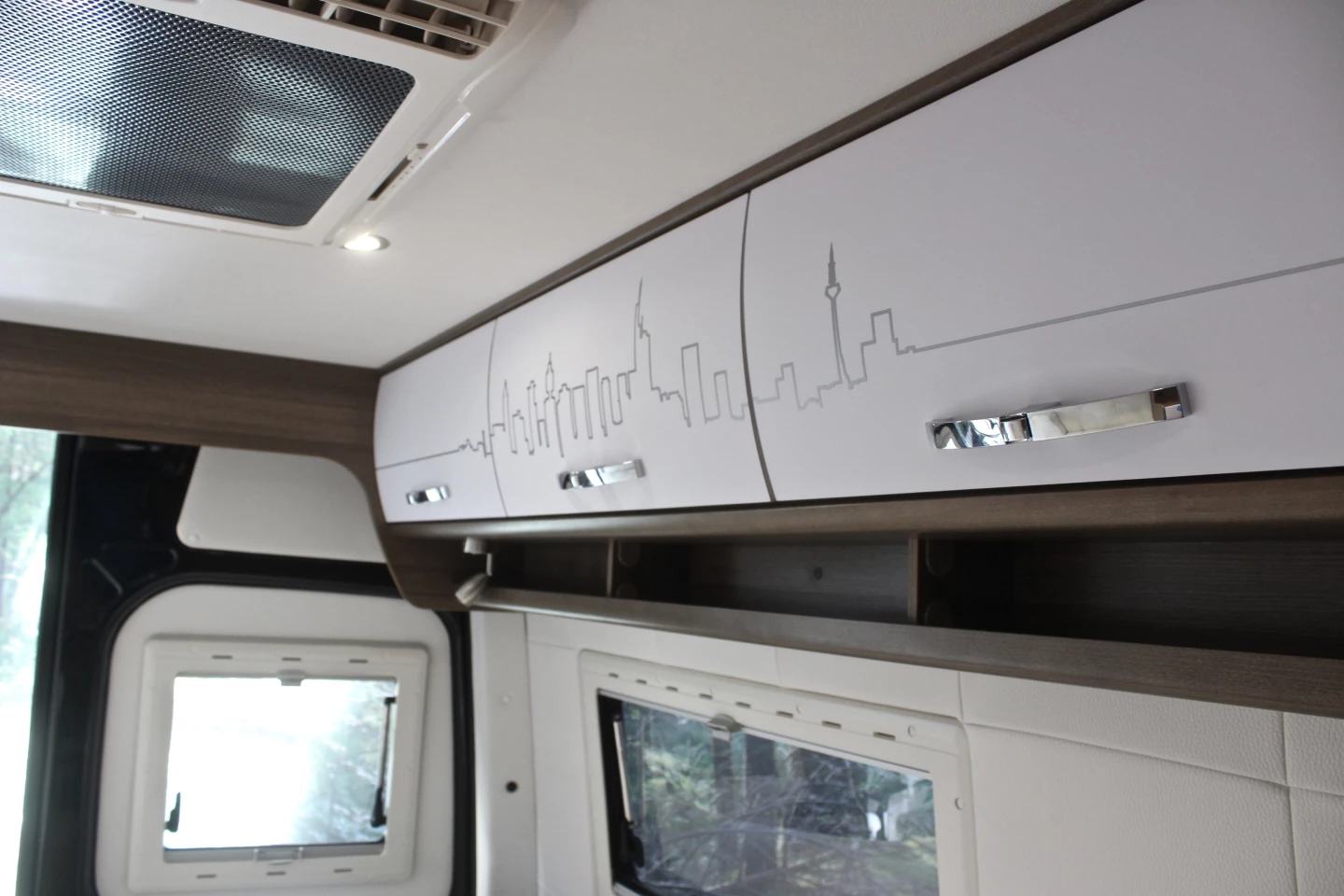 The skyline graphics on the cabinets are a nice touch