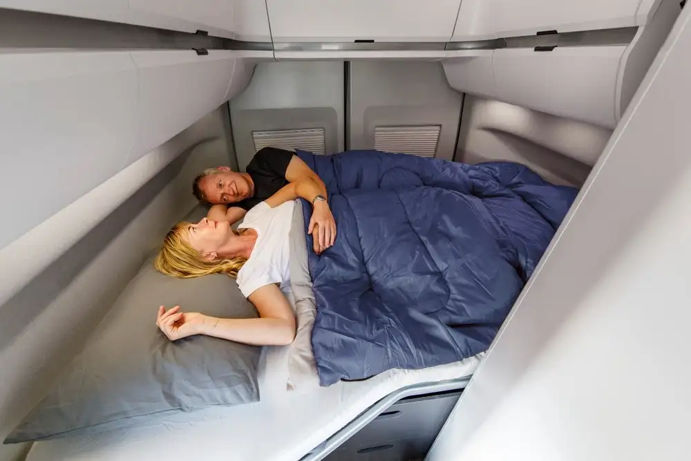 The Grand California 600 has a transverse rear bed and available kids' alcove bed for up to four people