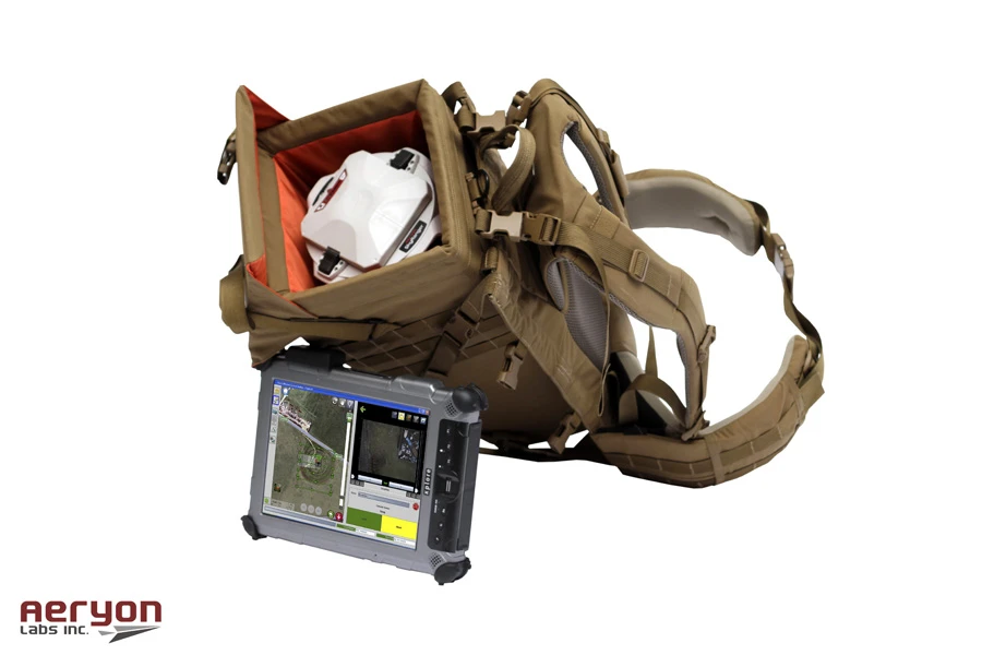 A lone operator pilots the SkyRanger with a tablet-like Ground Control Station (GCS) using simple touch controls to program a flight path or aim an onboard camera