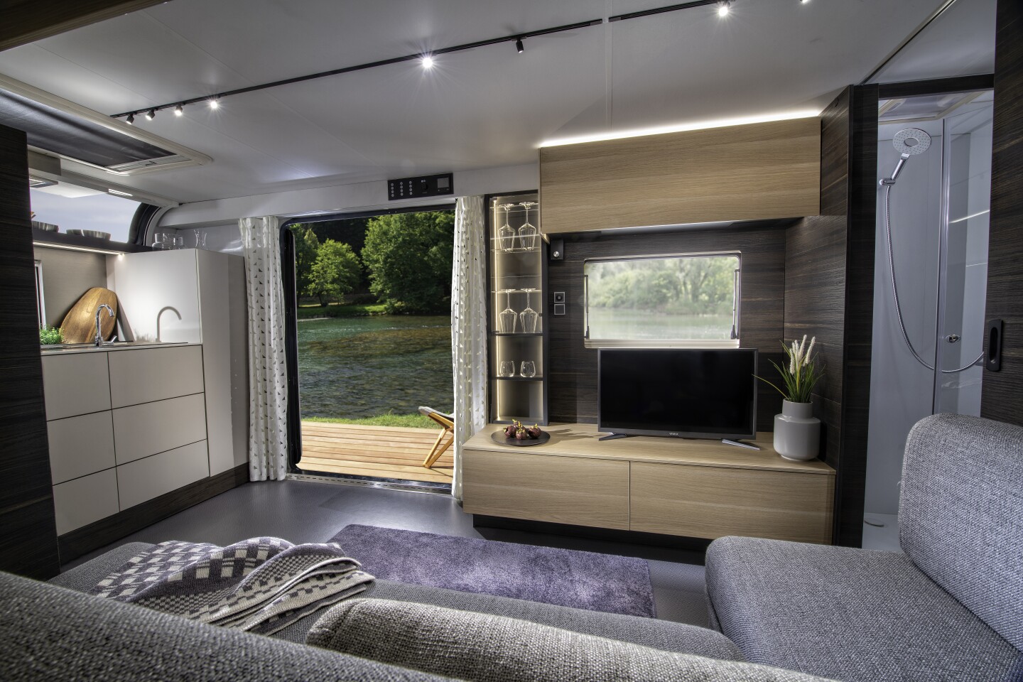 A peek at the Astella 704 HP living room, kitchen and shower room