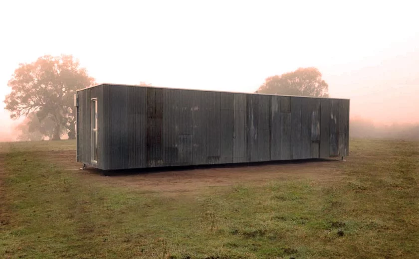 The modest home was specially designed to blend into its natural landscape