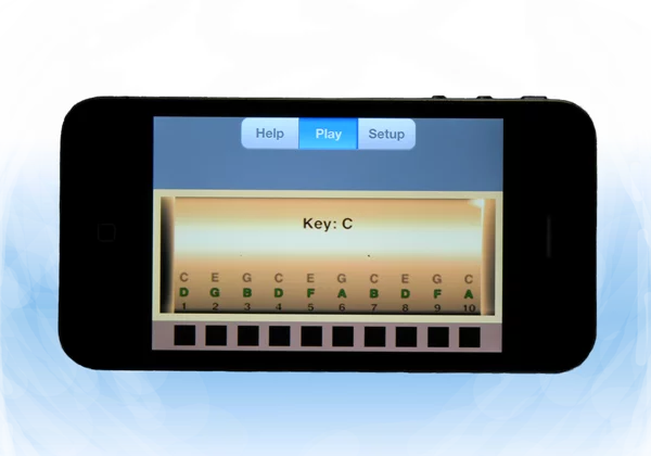 The iMonica app digitally recreates a diatonic harmonica on an iPhone screen, which can be played using a combination of mouth position and raising or lowering the smartphone