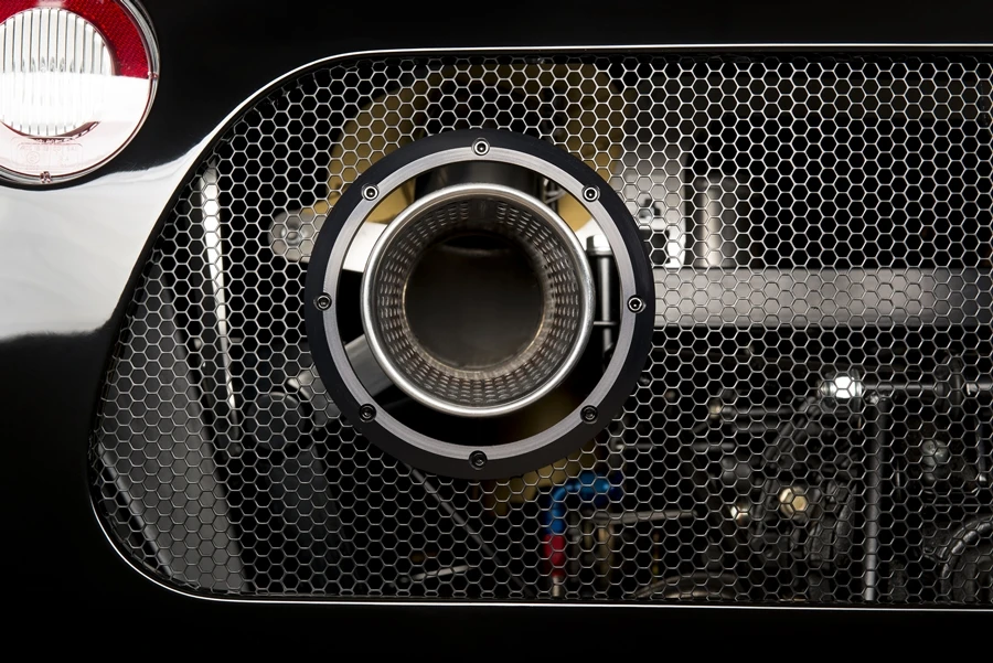 Ultima Evolution machined tailpipe trim rings and new rear grill design