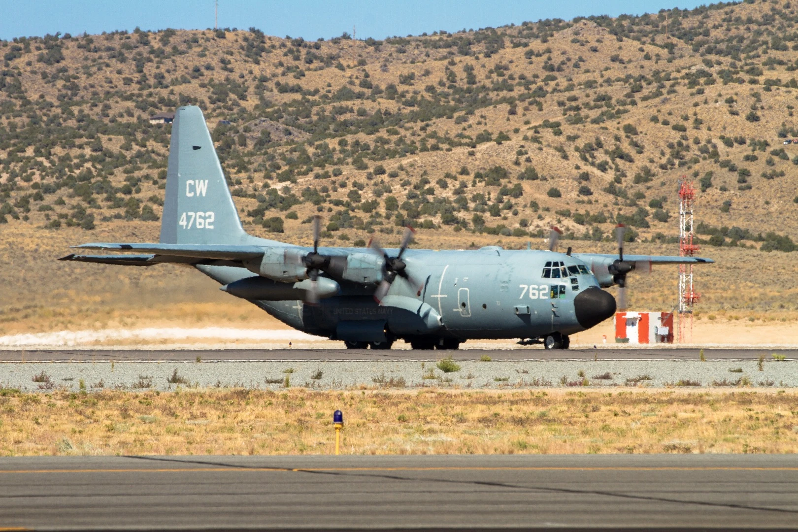A gigantic Lockheed C-130T Hercules makes an appearance