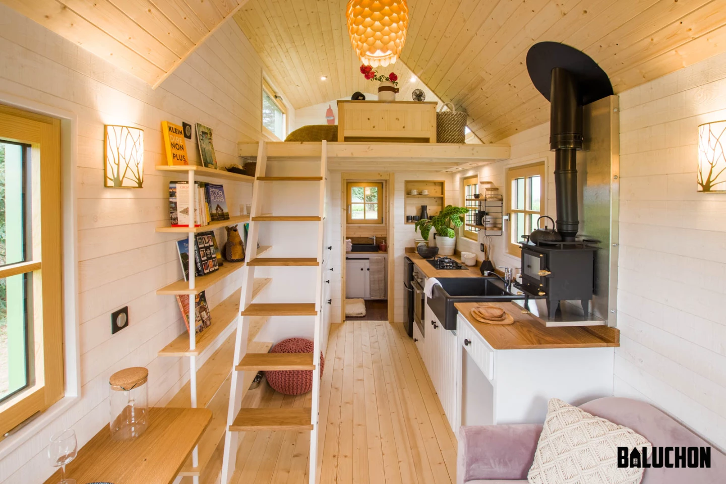 La Mésange Verte's interior layout is simple, with the living room at one side of the home and the bathroom at the other