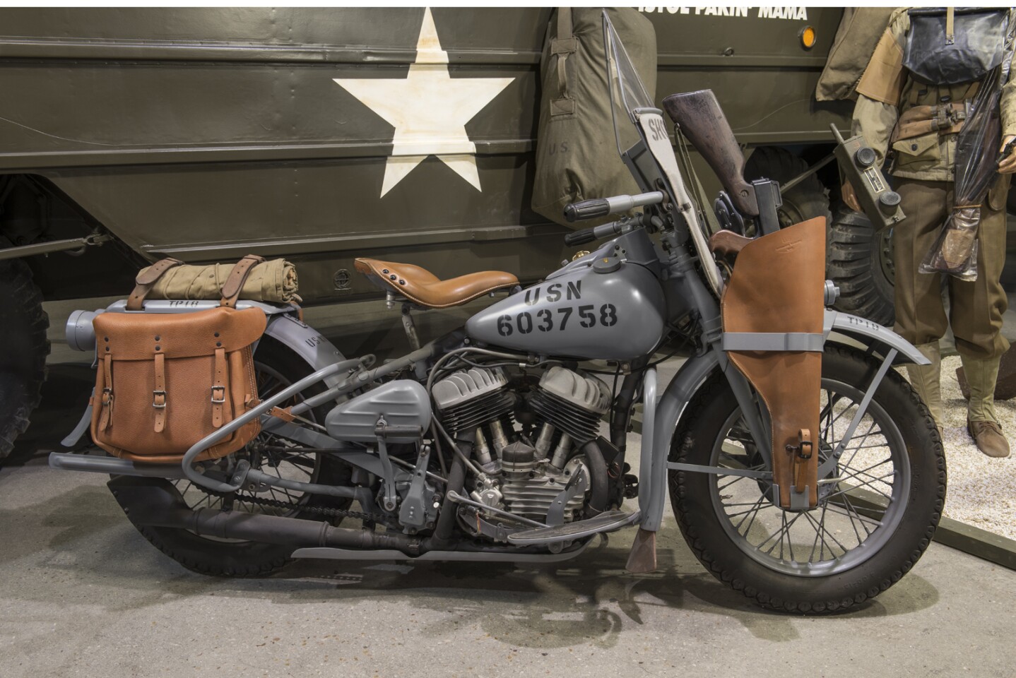 Harley-Davidson was yet another brand to reach iconic status thanks to this global conflict. The distinctive 60 degree V-twin exhaust note of Harley-Davidson's WLA military motorcycle heralded the arrival of the cavalry to every country in Western Europe and became a symbol of American values. Despite being an inferior machine in service compared to the German parallel twin BMWs (see below), the Harley brand name invisibly went global over the 14 months following D-Day and in a world where a Japanese, then Korean, then Chinese manufacturer can copy anything, Harley-Davidson's brand values cannot be replicated. This particular Harley-Davidson WLA 750cc became the new world record holder for the model at the D-Day sale, selling for €66,960 (US$74,708).