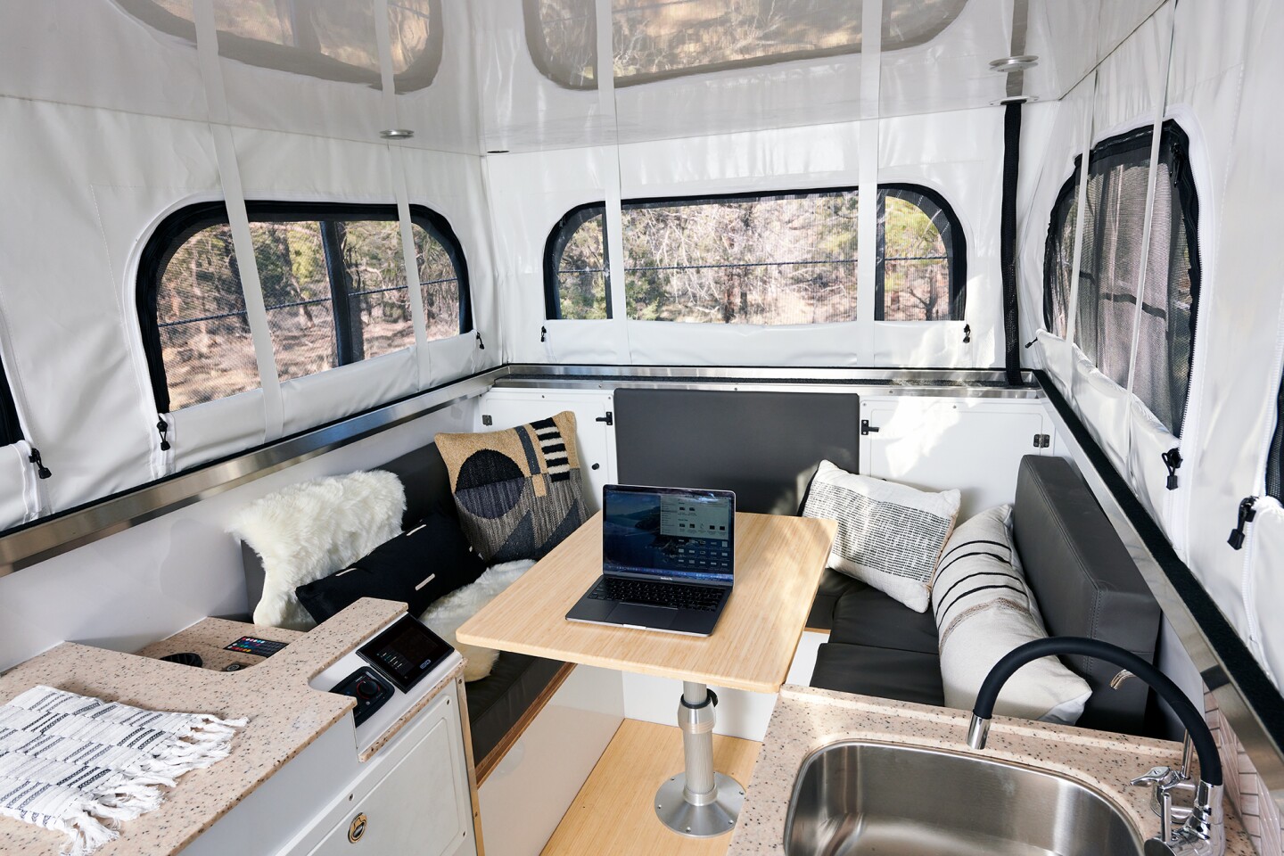 Sit or stand at your desk with EarthCruiser's versatile adjustable table