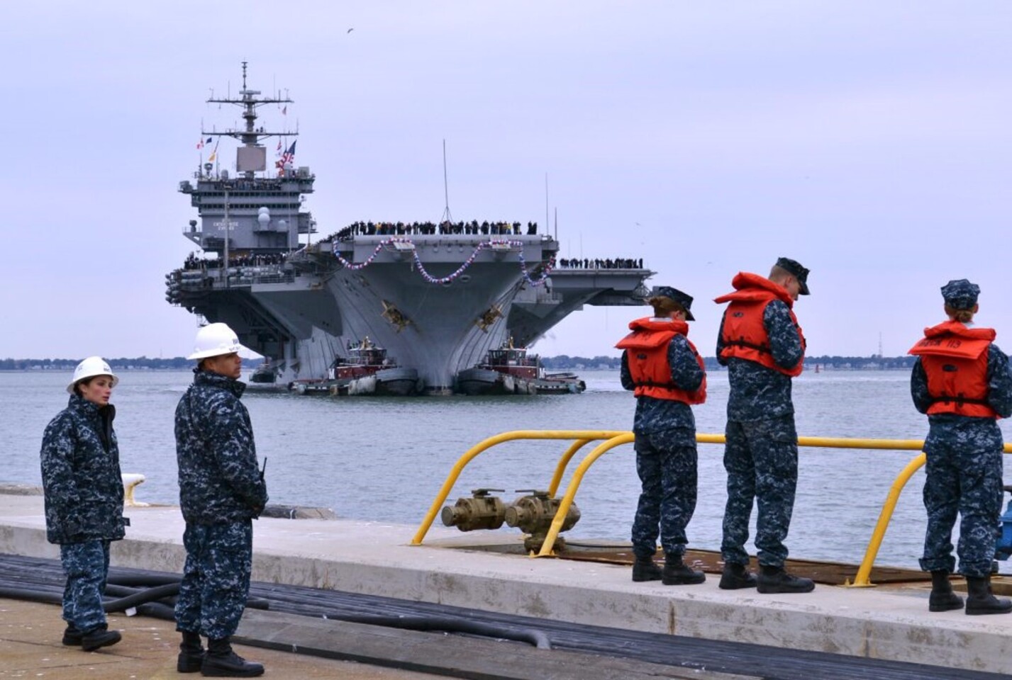 USS Enterprise being towed for deactivation