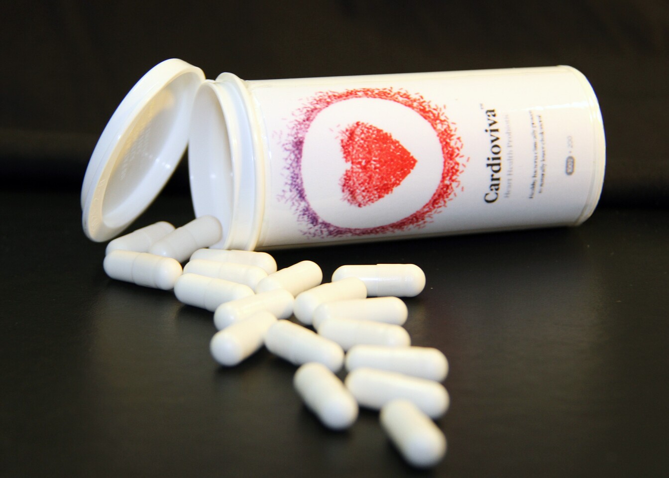 Capsules containing Lactobacillus reuteri NCIMB 30242 bacteria