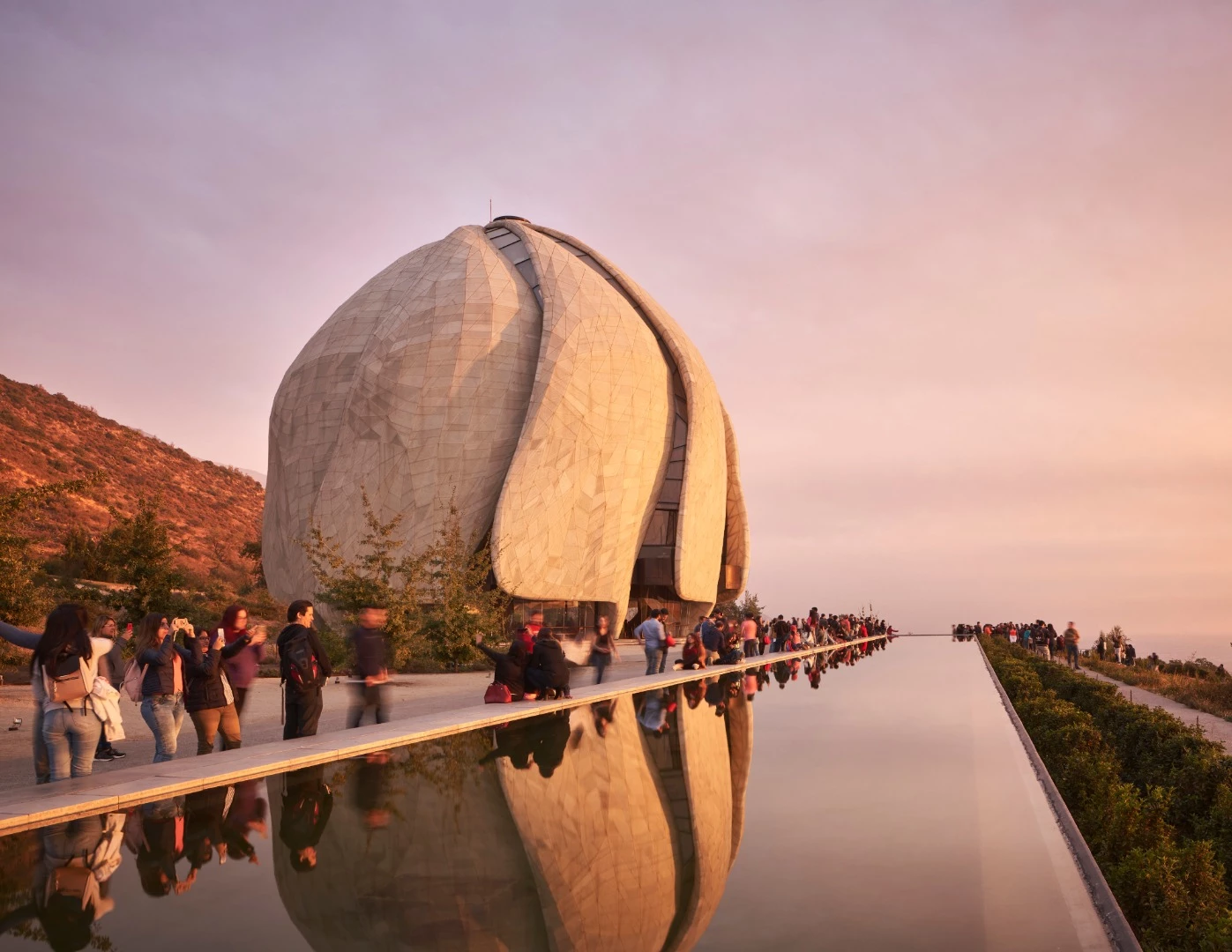 Bahá’í Temple of South America with reflecting pool and visitors