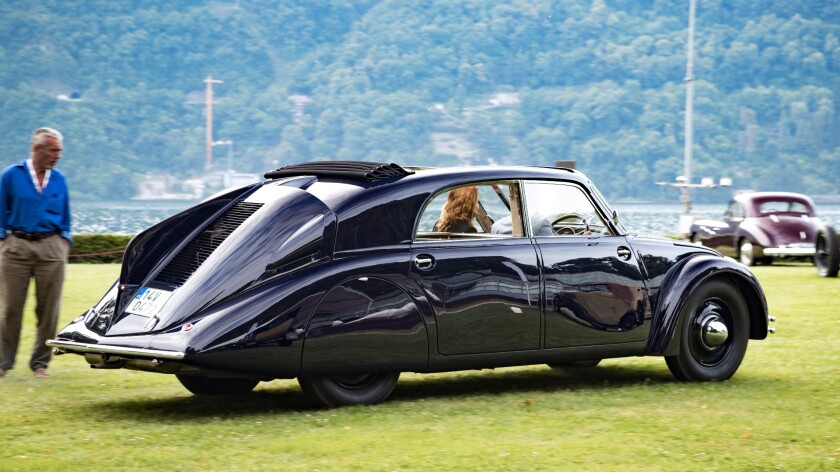 The Tatra 77 is generally regarded as the first car to have been designed with aerodynamic principals in mind, having been penned by automotive genius Hans Ledwinka in conjunction with Paul Jaray, one of the first aerodynamic engineers and the man behind the aerodynamics of the Zeppelin airship. Indeed, as events played out in court after WW2 suggest, Ledwinka had a major hand in the design of the Volkswagen Beetle. The streamlined Tatra 77 Saloon of Tomáš Hoferek had the sunroof option, another ingenious Ledwinka innovation incorporated into the car. The voluminous cabin of the car, leather seats and forward thinking in the design of almost every aspect no doubt influenced the judges.