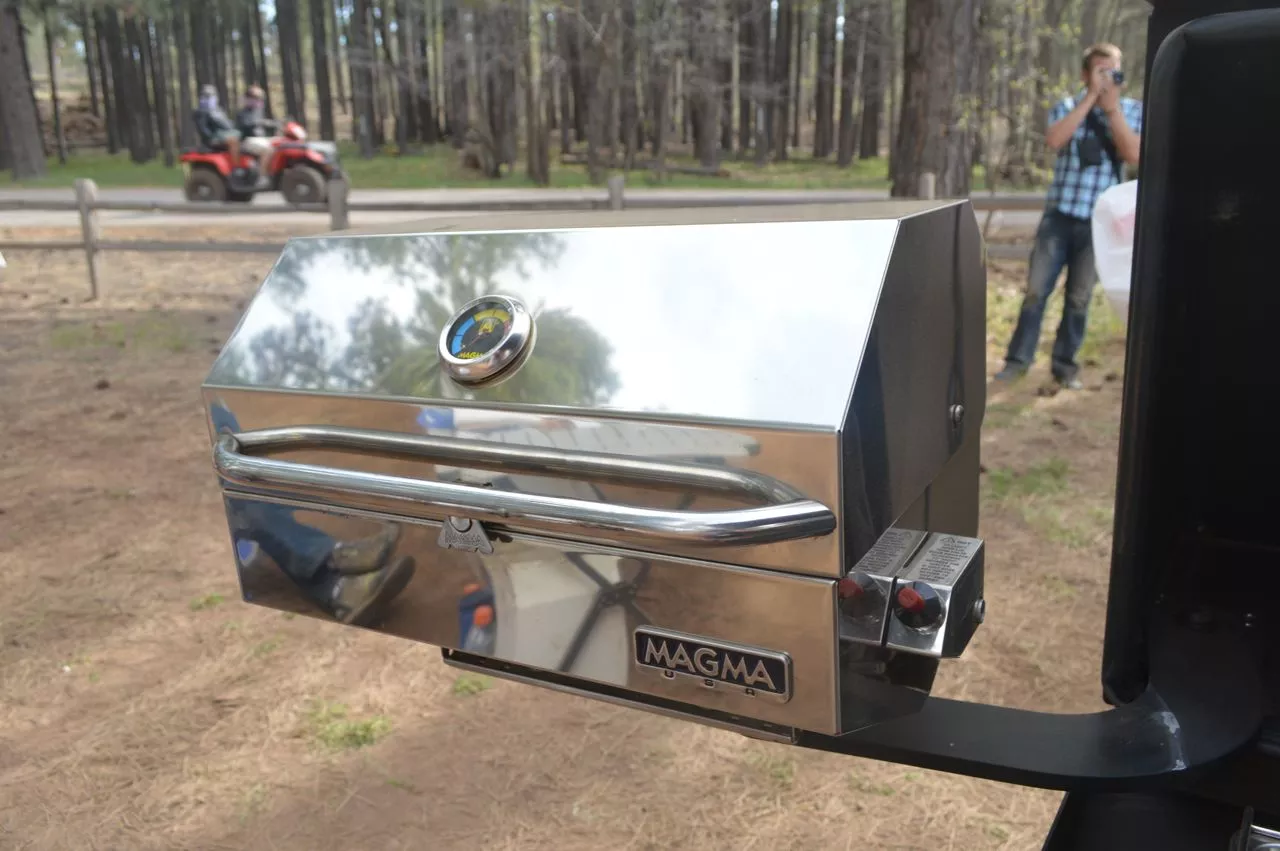 The tailgater option includes an external swing-out kitchen with grill, stove and sink