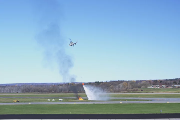 The unmanned K-MAX helicopter put out a fire with the aid of an Indago quadcopter