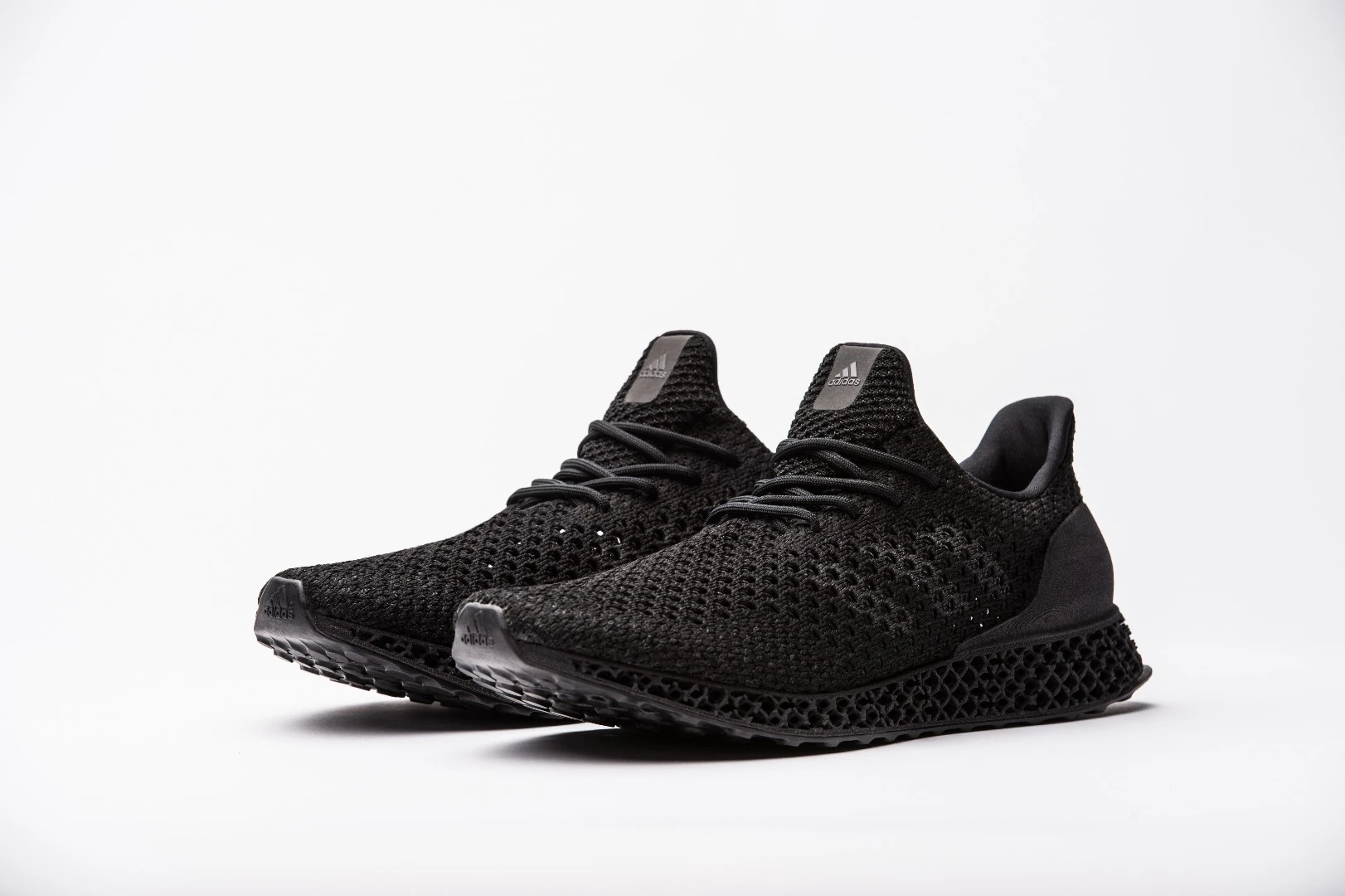 The shoes' upper is made from a combination of open and lose knitted structures