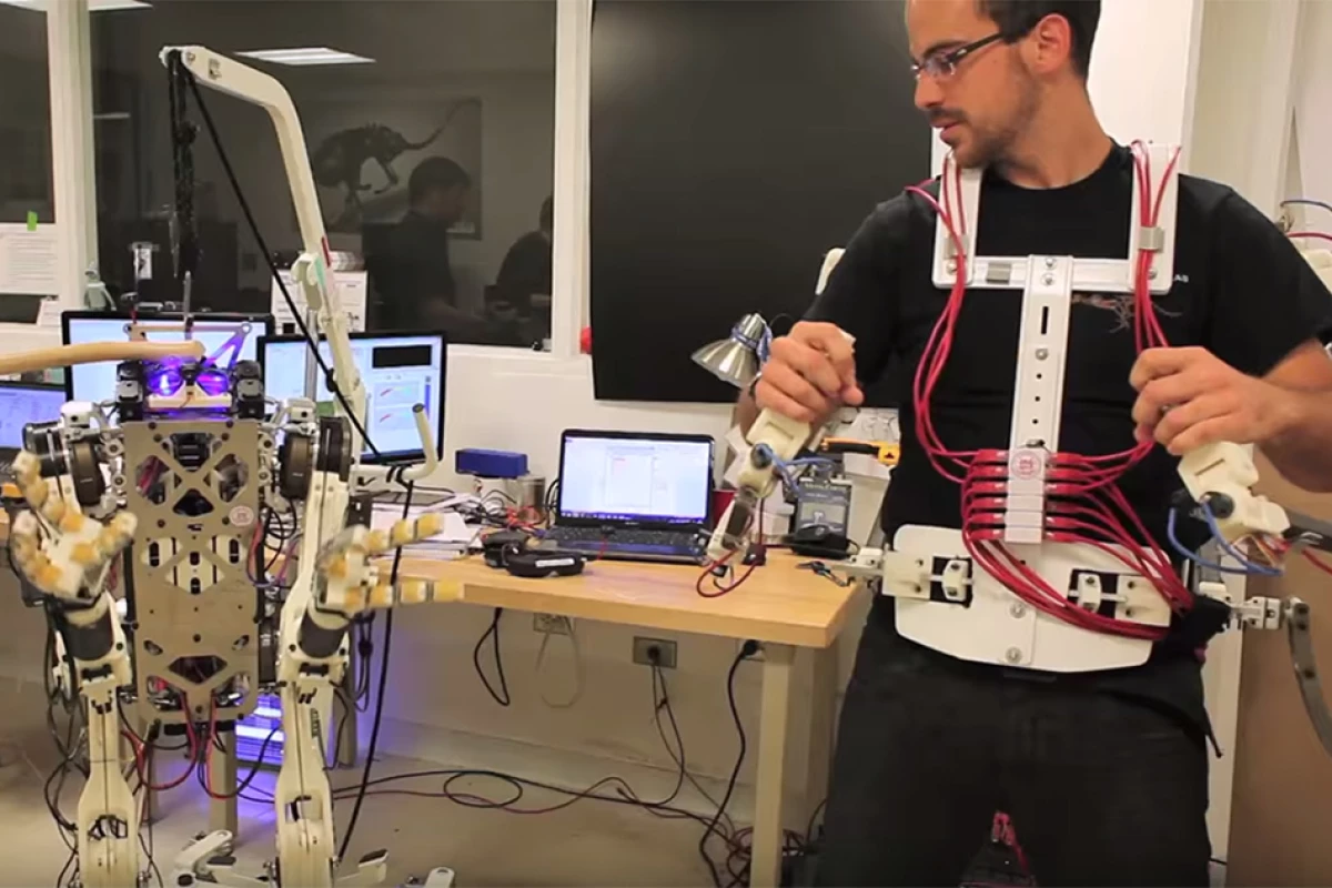 The vest provides force feedback between the operator and robot