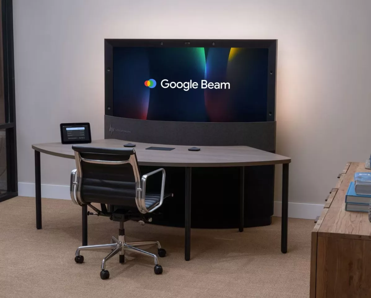 This is the setup you'll need to make a Google Beam call, including the screen, desk, table mics, and wireless controller