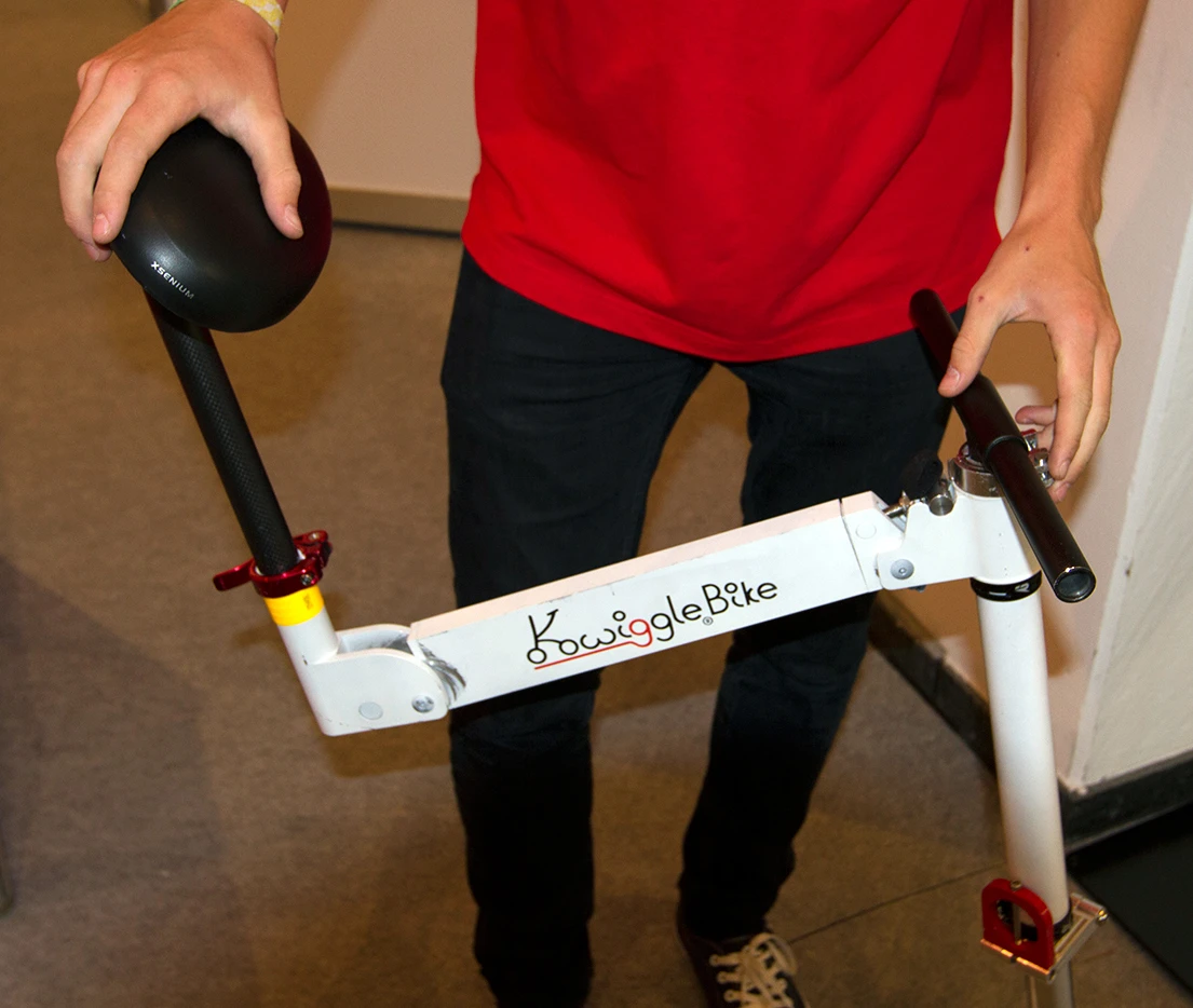 The folding process starts by lowering the seat