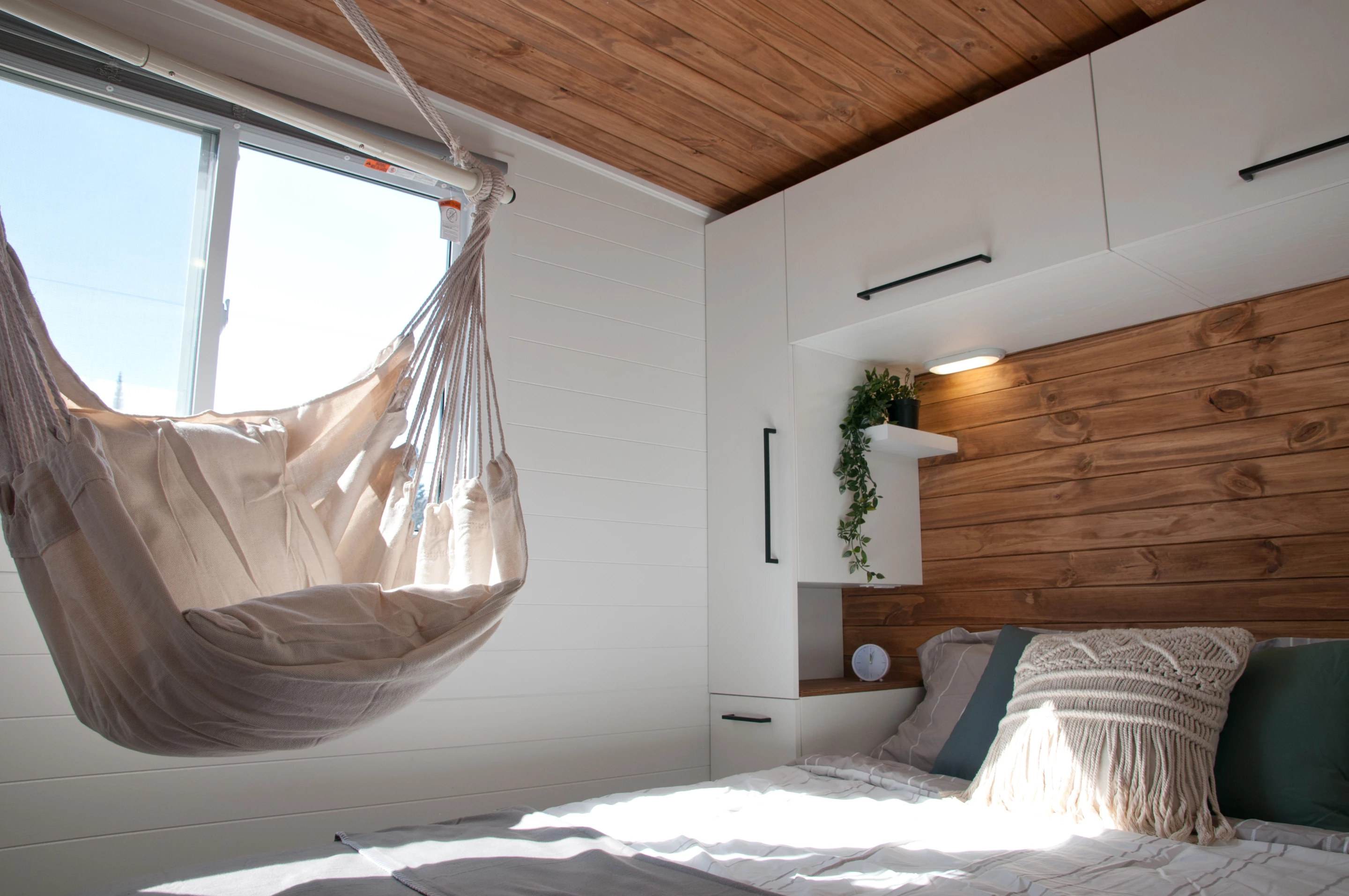 The Nomad's bedroom can include an optional seat suspended from the ceiling