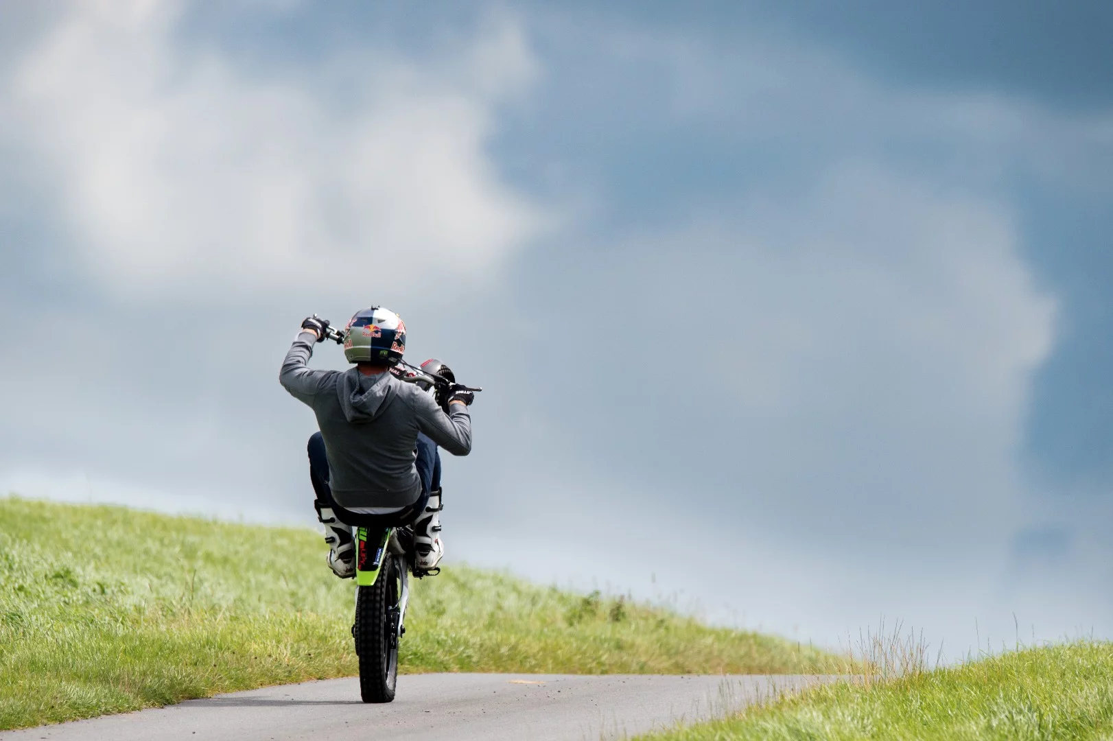 Dougie Lampkin wheelies off into the distance