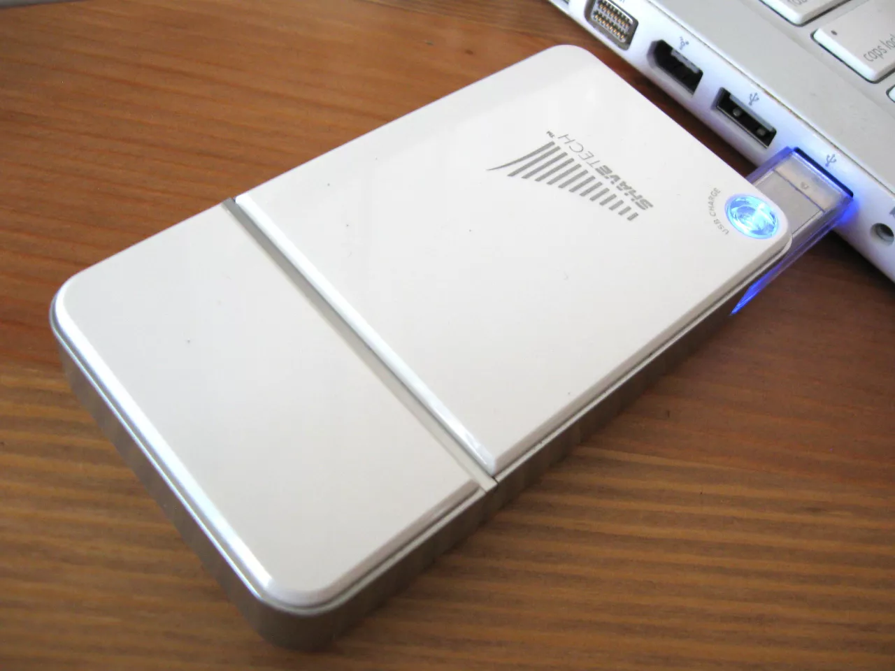 The ShaveTech's USB dongle glows blue while charging