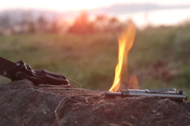 The Endure has everything you need to start a flame: ferro rod, striker and tinder