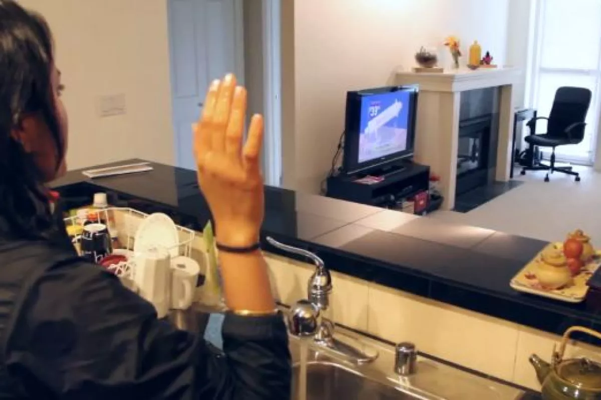 A WiSee user could control their TV using gestures, even if a wall separated them and the WiSee device
