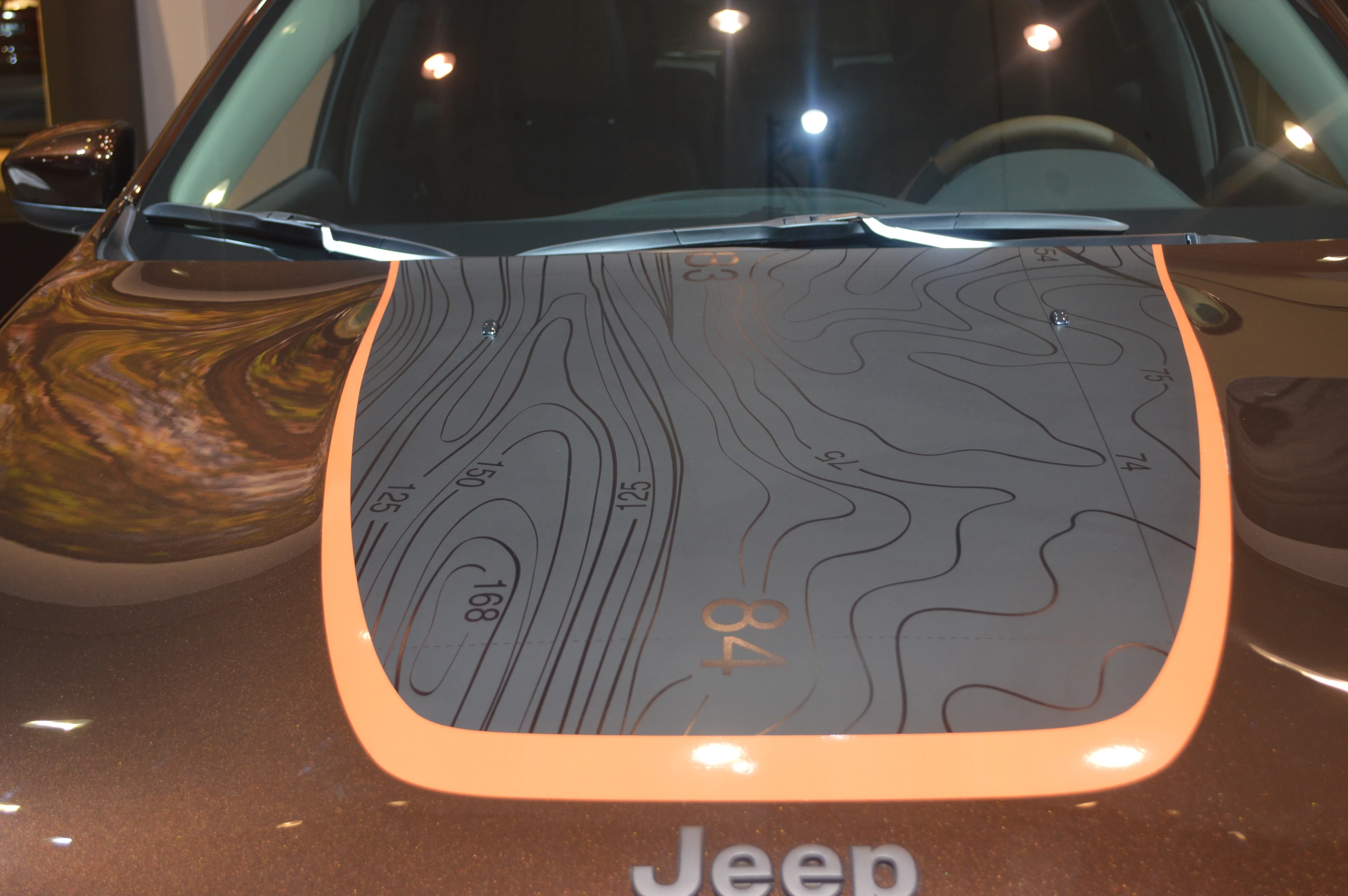 The Trail Carver features topo graphics