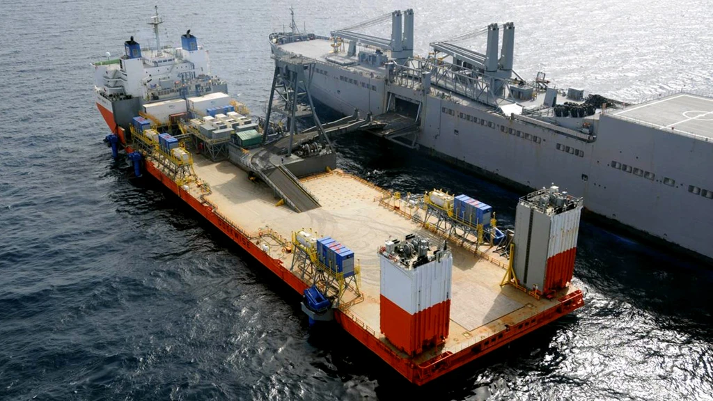 A sea exercise carried out in Jan. 2010 to demonstrate the transfer of vehicles between a surrogate mobile landing platform (MLP) ship and a large medium-speed roll-on/roll-off (LMSR) ship (Image: U.S. Navy)