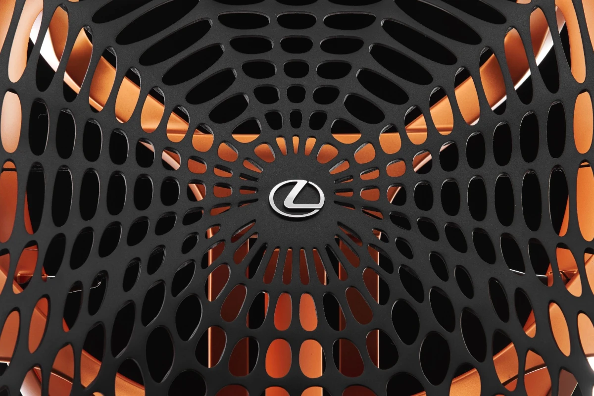 The back rest is both made from synthetic spider silk material and inspired in form by the spider web