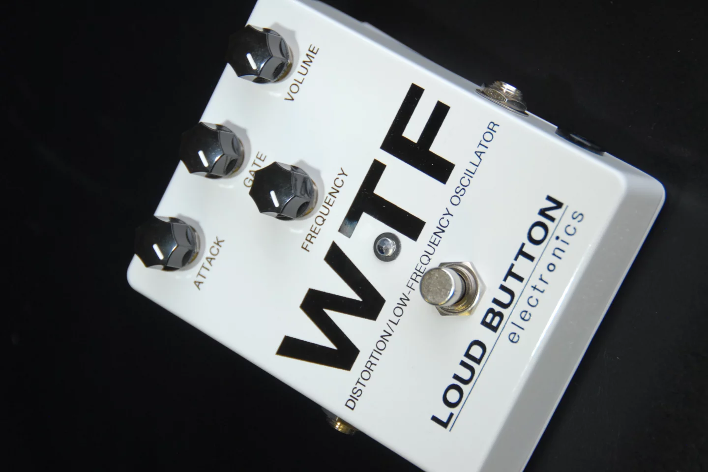 The attack dial to the left modulates the LFO to provide variable envelope sweep and octave-down effects