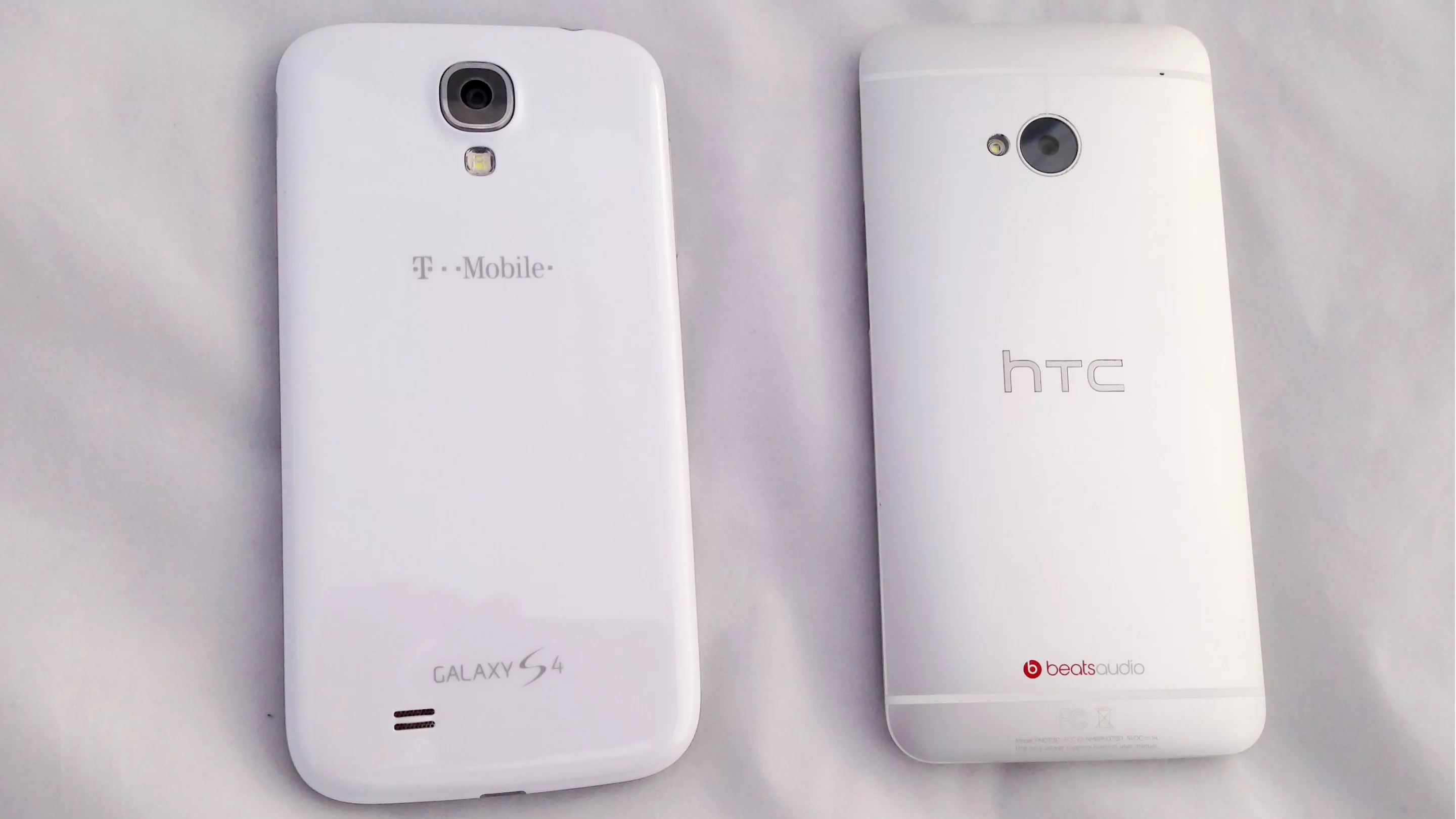 The GS4 (left) is made of plastic, while the One is made of aluminum