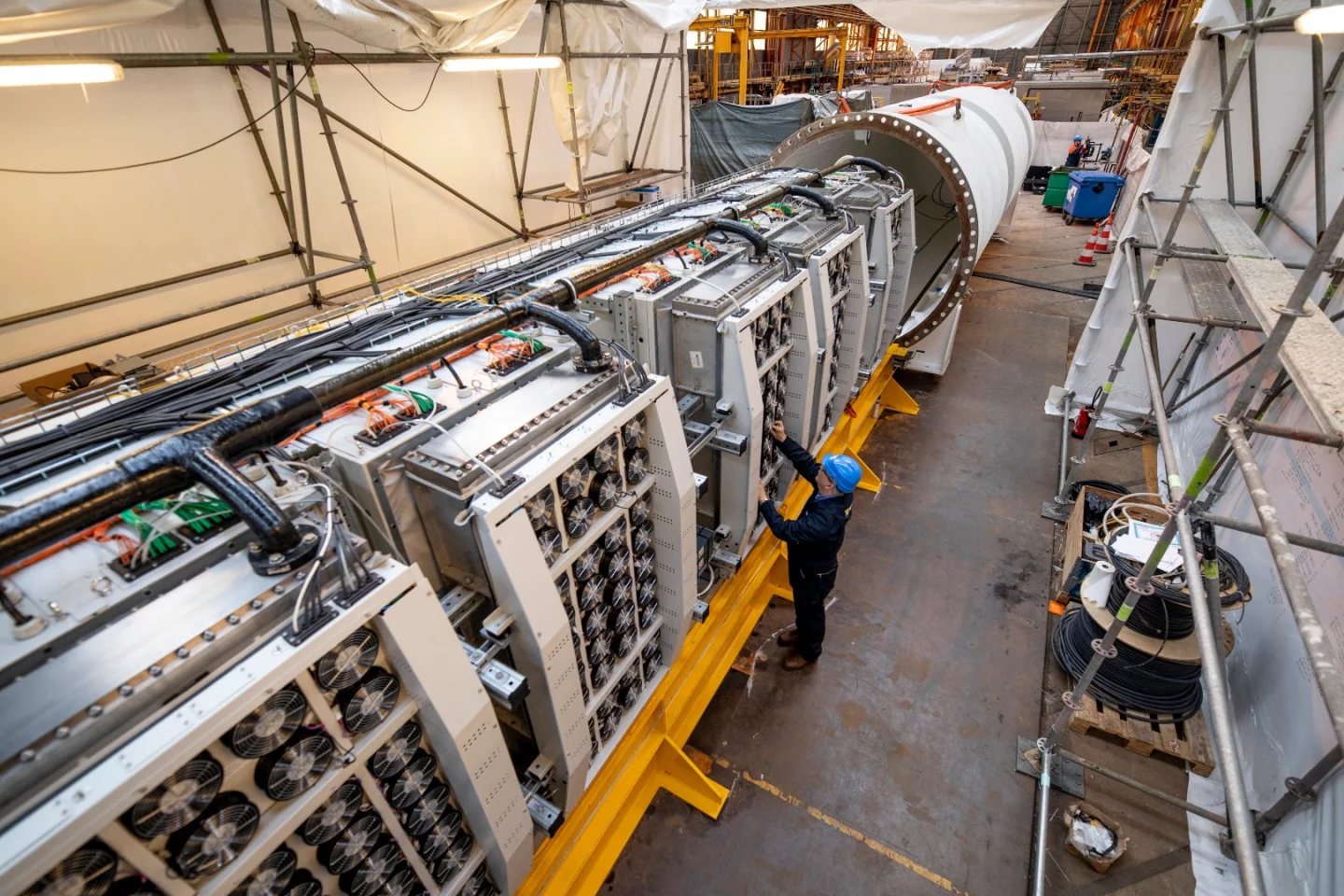 The Project Natick data center is cooled using a similar system to submarines, where seawater is piped through the radiators on the backs of the server racks and then back out into the ocean