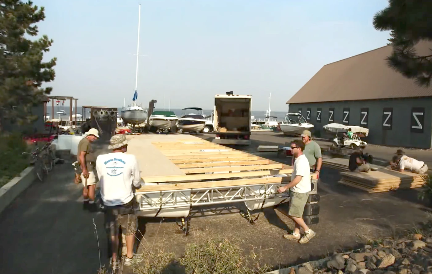 Both wooden ramps rest on top of a 36 ft (11 m) long floating platform