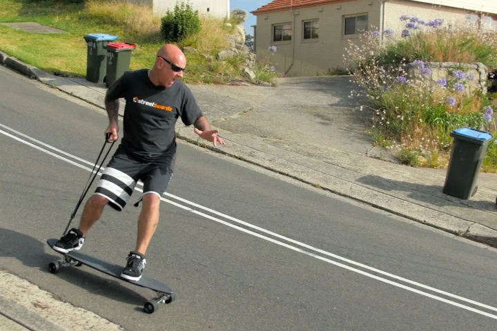 The Boarder Control Skateboard has a rear leash, which activates a set of brakes when pulled