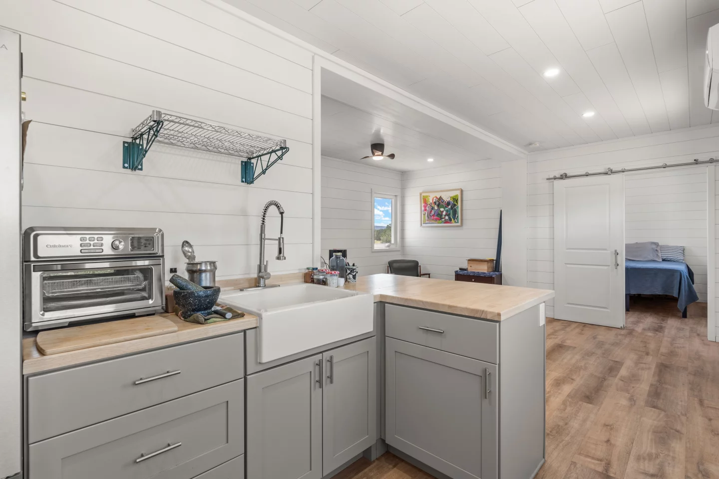 The Luke's kitchen includes a sink and cabinetry, as well as space for more appliances
