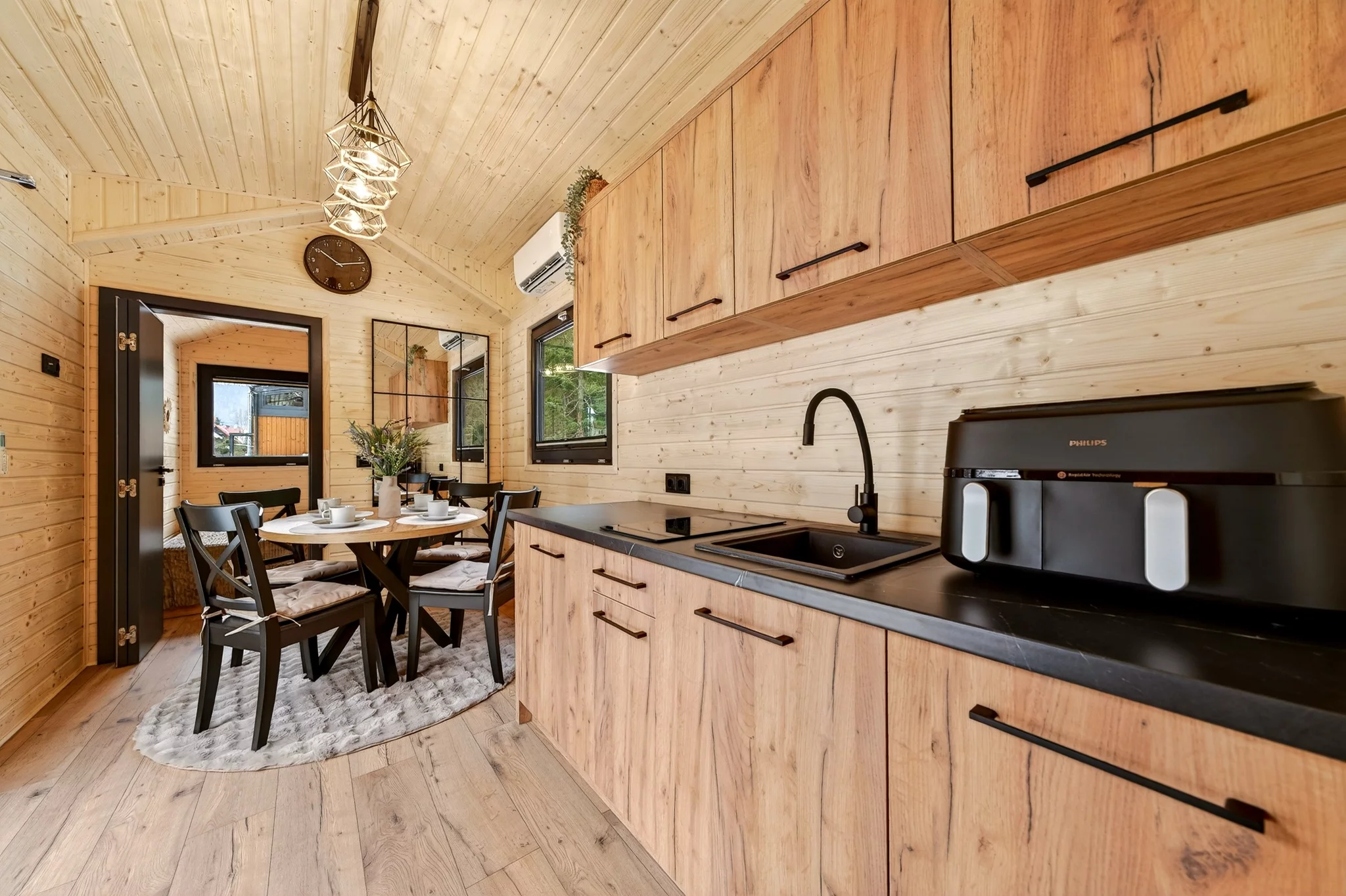 The center of the Justine's single-floor layout is taken up by its kitchen