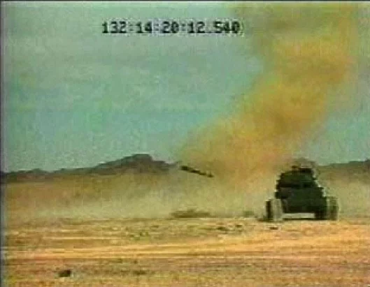 A Hellfire II missile about to obliterate an armoured vehicle. Click on the image for a preview, click HERE for a Quicktime video.