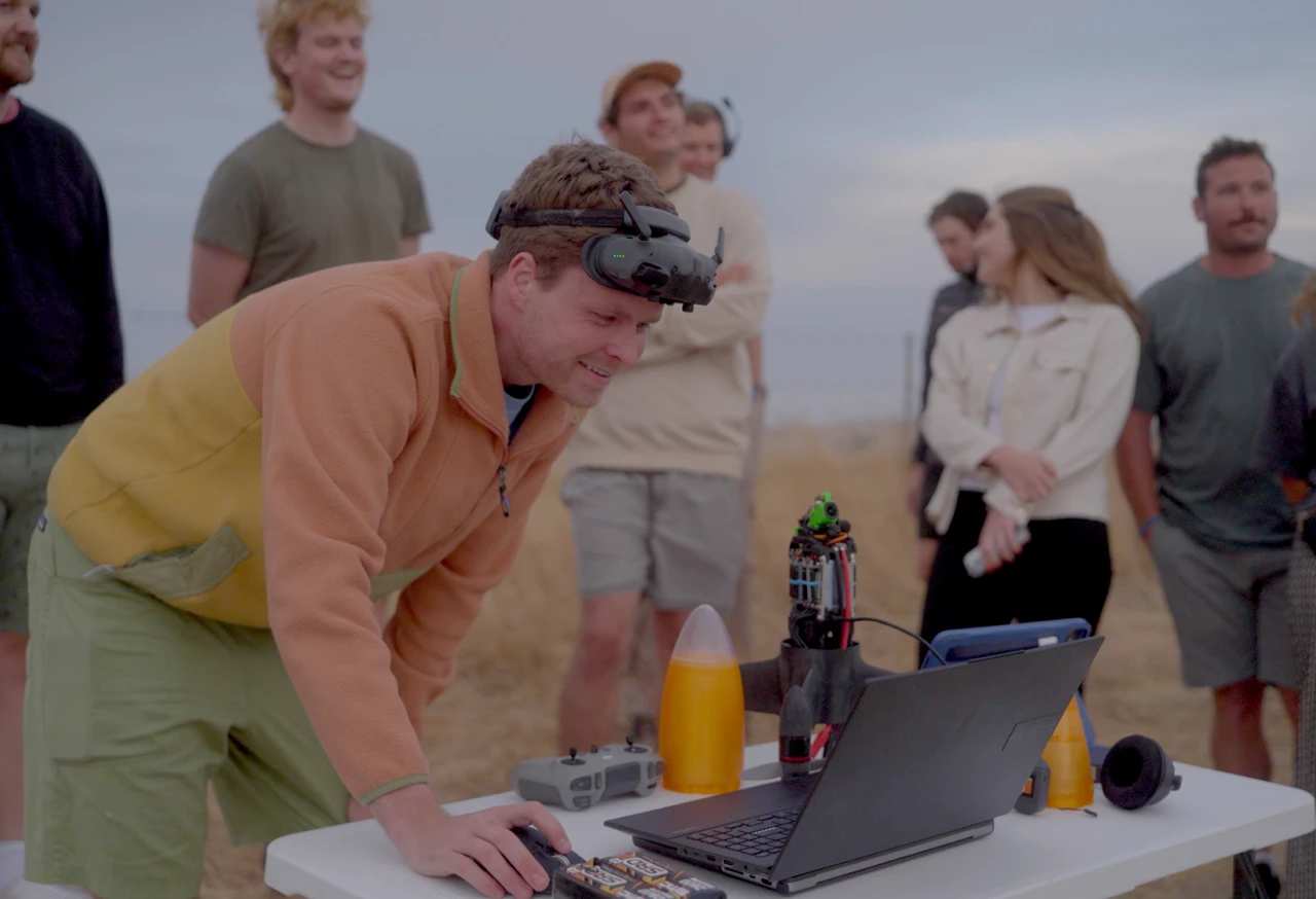 Luke Bell examining flight data before the Peregreen V4 quadcopter makes its record flight