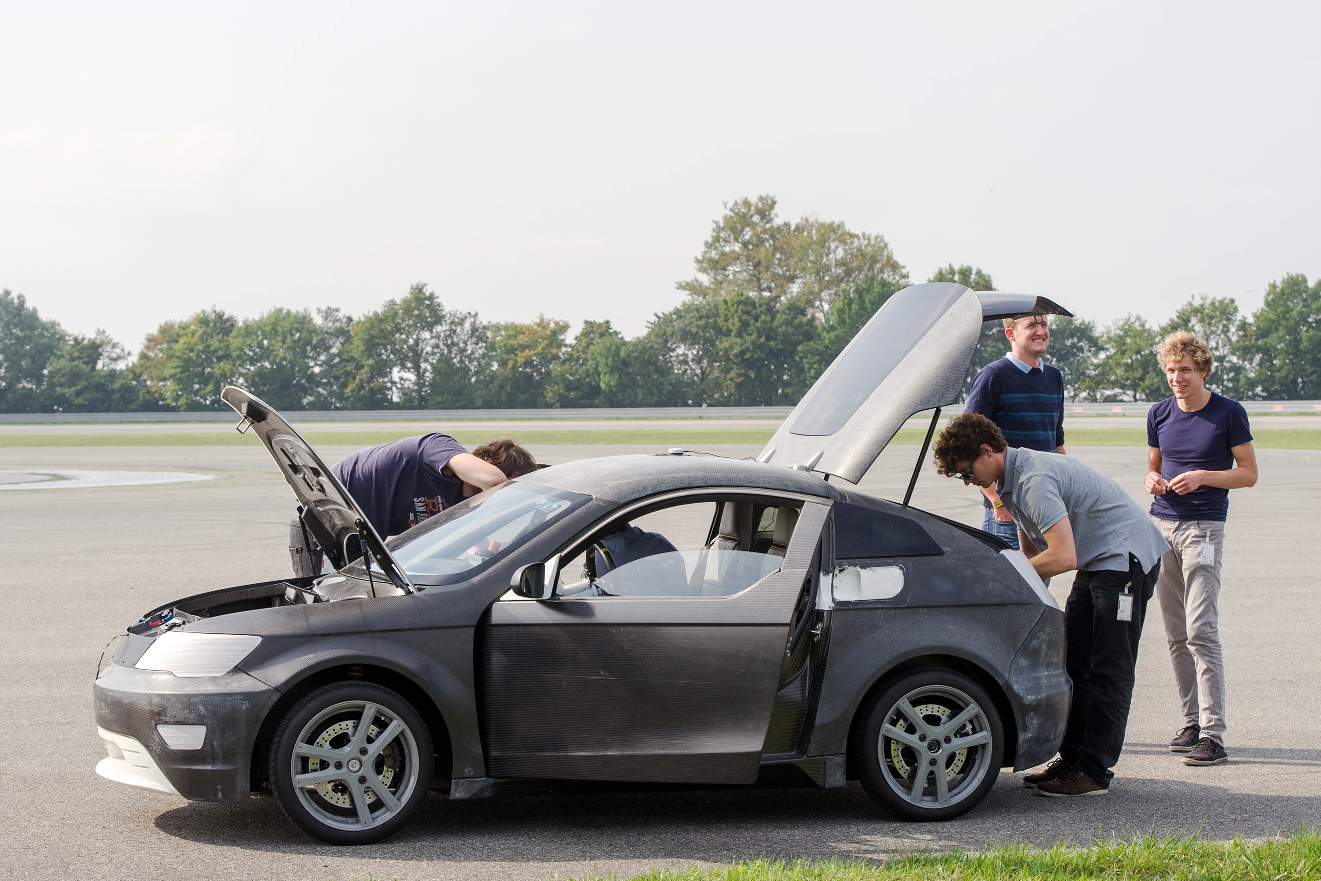 Heat generated by the running of the car is recovered for use in heating the cabin, plus a carbon-neutral ethanol-powered heater is on hand for use in particularly cold climates