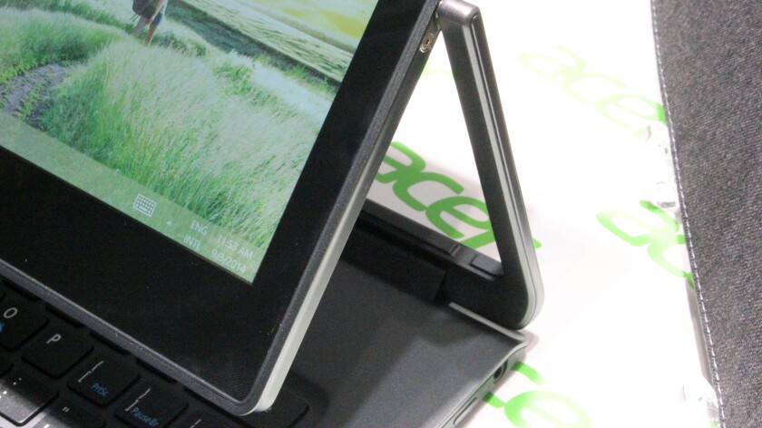 The R13's hinge allows the system to easily switch between laptop and tablet form-factors