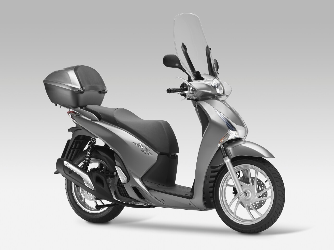 The under seat storage area on the new SH models has been increased to accept a full-face helmet