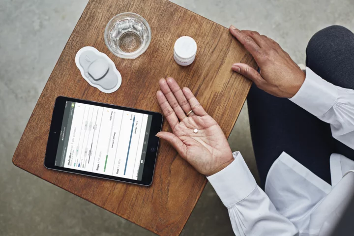 The smart pill contains a drug and a sensor that notifies an app recording when the patient has consumed the medication