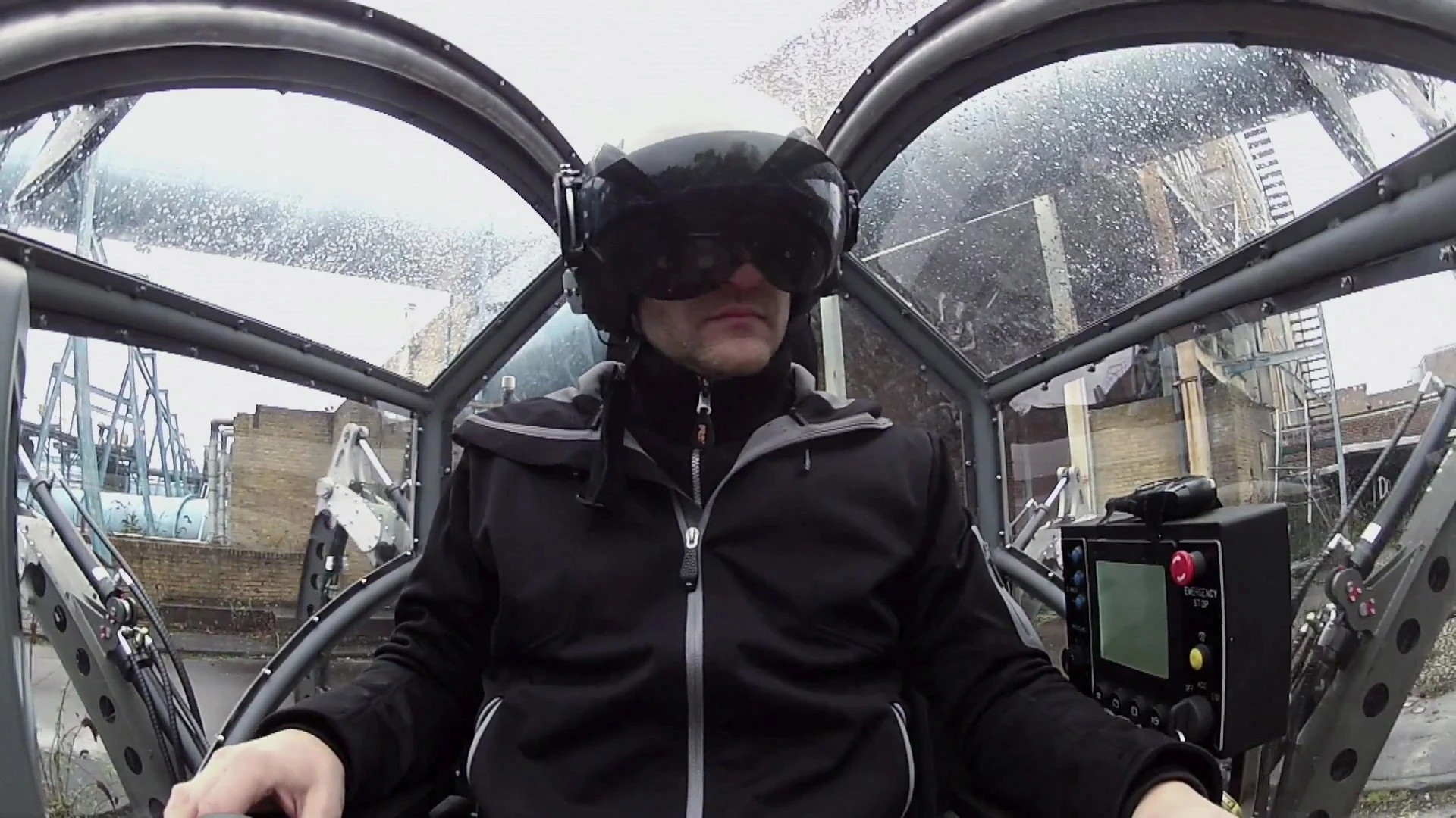 Matt Denton, the chief designer of Mantis, drives it around an abandoned factory site